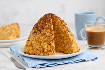 Traditional russian cake Anthill made from shortcrust pastry and condensed milk with butter. Selective focus