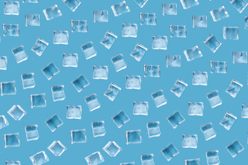 Pattern from ice cubes on a blue background.