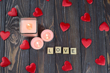Love letters on the table. Heart, love, candle with flame. Postcard, wallpaper, banner, background. Valentine's Day.