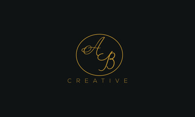 Fototapeta premium AB is a stylish logo with a creative design and golden color with blackish background.