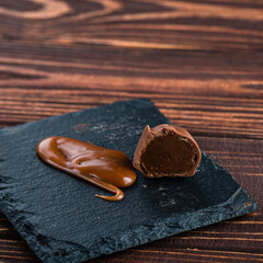 chocolates with salted caramel. Melted caramel candies and caramel sauce with a salt. Close up Gourmet salted caramel truffles