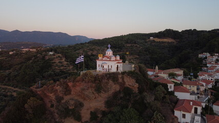 Fototapeta na wymiar Church In the Mountain at Samos Island, Karlovasi during summer sunset.