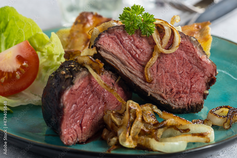 Poster closeup of a cut steak