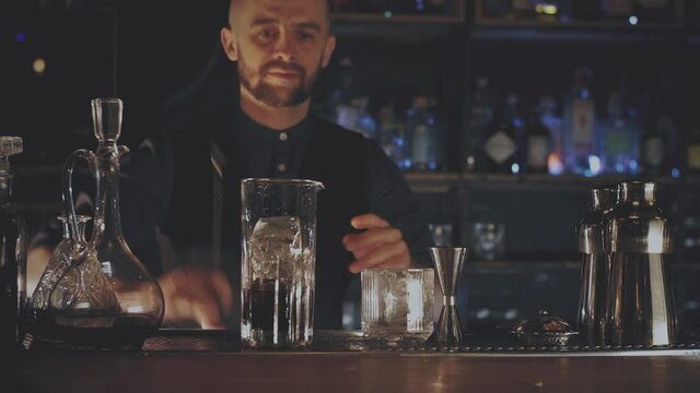 Bartender making a cocktail at the bar