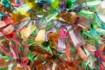 Fototapeta premium flowers made from painted PET bottles - closeup texture background