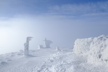 Babia Gora peak in misty winter scenery. Diablak, Babiogorski National Park, Beskid Zywiecki, Poland