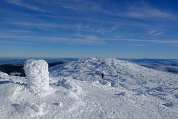 Silhouettes of tourists on trail in Babia Gora massif. Diablak, Beskid Zywiecki, Babiogorski National Park,  Poland