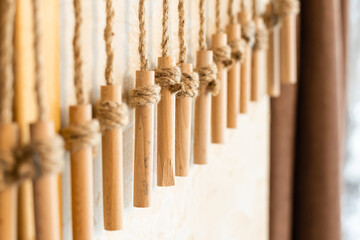 wooden handles hang on a rope, decor