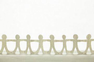 Paper human chain on clear white background, teamwork, people join together, and friendship concept