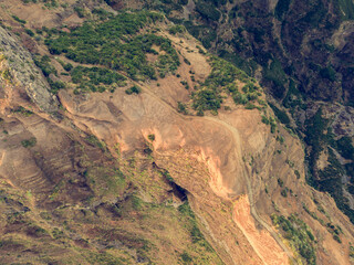 Drop down view of trail following volcanic mountain ridge.