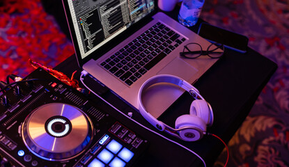 DJ mixing console. Tune in before a concert