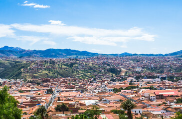 Fototapeta na wymiar panoramic view of red tile roofs and white walls buildings at sucre white city in bolivia