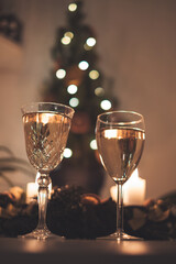 glasses of champagne and christmas tree