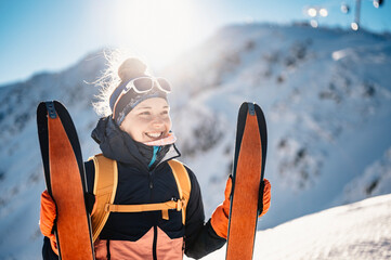 Mountaineer backcountry ski walking ski alpinist in the mountains. Ski touring in alpine landscape...