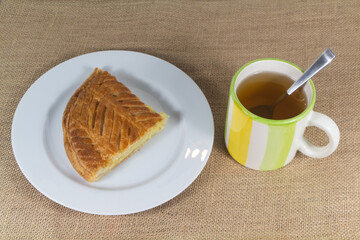 Cup of tea and french king cake