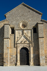 Fototapeta premium View of the Santa Maria la Mayor church in Alcaudete (Spain) on a sunny winter morning
