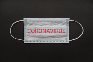 Medical mask isolated on background. Close-up of Coronavirus or COVID-19 protective face mask....