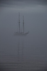Ship on a foggy morning, ghost ship in fog