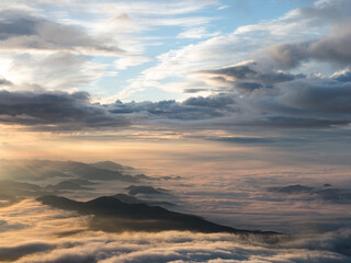 sunrise over cloudscape as seen from mount fuji in japan