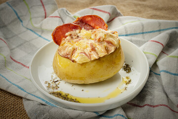 Baked potato with pepperoni and cheese
