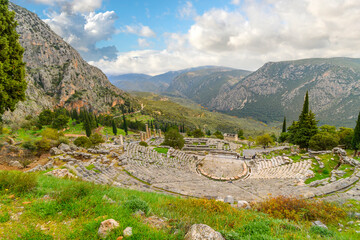 View of the ancient theater from the sacred temple complex of the Greek Oracle at Delphi, Greece at autumn. - Powered by Adobe