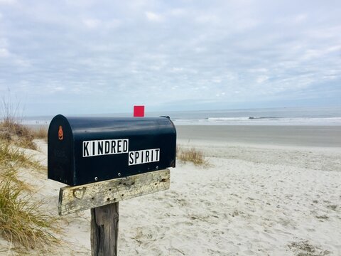 Bird Island, North Carolina, US - December 28, 2019: Kindred Spirit Mailbox, a unique landmark on Sunset beach. It serves as Symbol of Hope, and collects secrets from visitors who open up their hearts