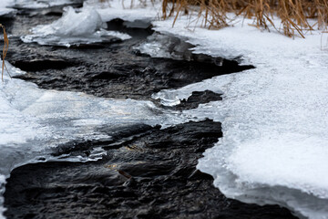 Ice flower and frost pattern on the stream cold winter.