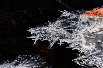 Ice flower and frost pattern on the stream cold winter.