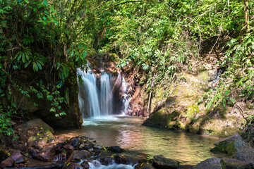 Fototapeta na wymiar El Tirol waterfall in the high rainforest of Chanchamayo in Junin, Peru