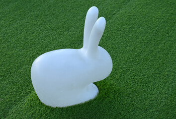 White rabbit toy on the grass