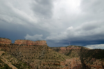 Fototapeta na wymiar Monsoon storm forming above a desert canyon
