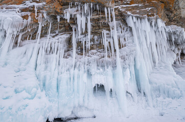 Beautiful landscape of an ice formation such as Ice spike and Icicle forming in a temperature below 0 °C in lake Baikal, Russia. The water in Lake Baikal freezes in bizarre shapes in winter season.