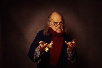 Scrooge having too much gold coins to hold in his hands, wearing a scarf - obrazy, fototapety, plakaty