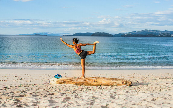 Yoga on Playa Conchal, a beach made of seashells, Guanacaste, Costa Rica