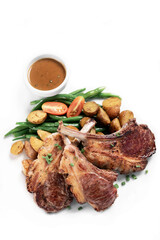australian organic lamb chops with gravy meal on white backgroundv