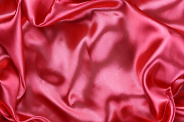 Red wrinkled cloth background for design in your work concept.