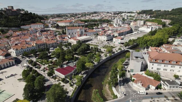 Lis river crossing Leiria city, aerial view of Portuguese town downtown