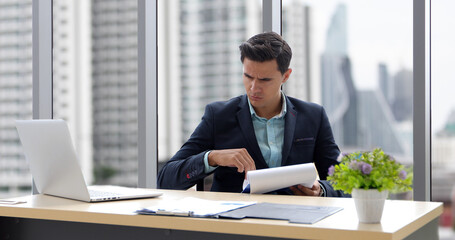 Fototapeta premium business man and group using notebook for meeting and business men smiling happy for working