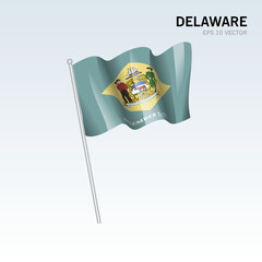 Waving flag of Delawarestate of United States of America on gray background