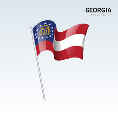 Waving flag of Georgia state of United States of America on gray background
