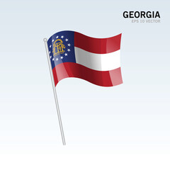 Waving flag of Georgia state of United States of America on gray background