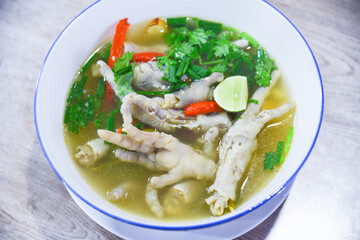 sour and spicy chicken feet soup, chicken feet soup bowl