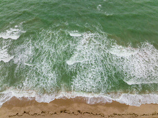 Smooth ocean waves on the beach