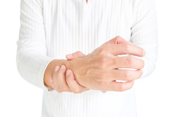 The man touches the wrist and thumb. He squeezes the knuckle of the thumb and wrist. He suffered a tendon injury, arthritis in his wrist, and de quervain's disease.