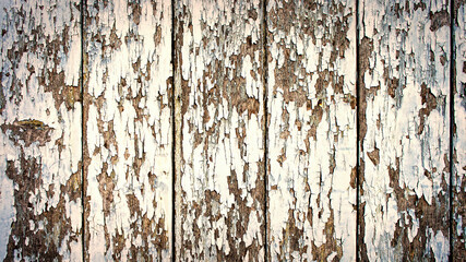 ペンキの剥がれた木製の壁の背景テクスチャー