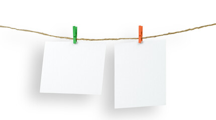 Photo frames. white paper sheets to dry on a rope on a white background