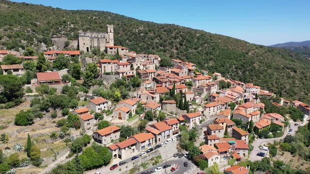 Panoramic view from above on the city Eus. Small town located on high mountain. Eastern Pyrenees. France. High quality 4k footage