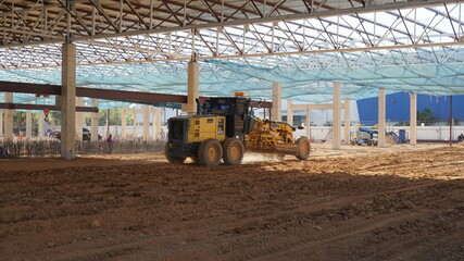 Adjust the ground, prepare for pouring mortar in the new construction factory area.