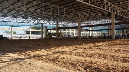 Adjust the ground, prepare for pouring mortar in the new construction factory area.