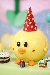 Funny yellow ducks decorated cakes for a baby shower birthday